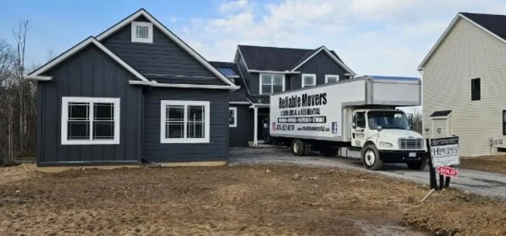 Reliable Movers crew performing a local move at a three-bedroom home in Lafayette, NY