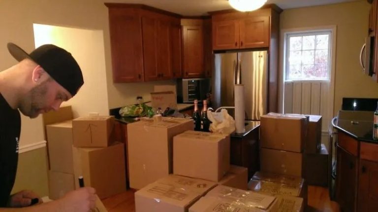 Reliable Movers preparing fragile household items for interstate transportation