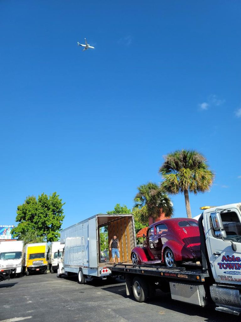 Florida. Loading a antique car on our new moving truck.