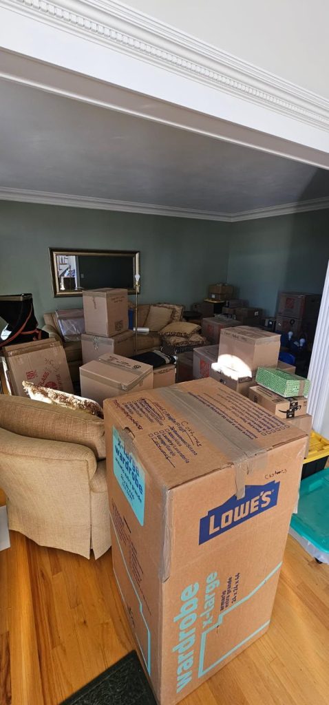 Reliable Movers crew completing professional packing with protective materials and organized labeling