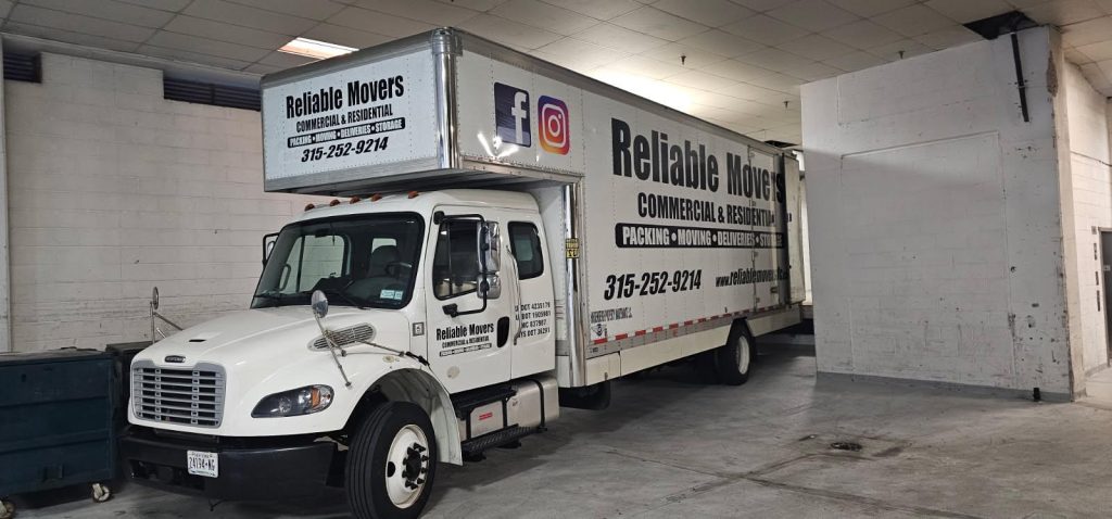 Reliable Movers crew completing a full‑service household move from Oswego, NY to Washington, DC on December 23, 2025, with movers loading and unloading items safely and efficiently.