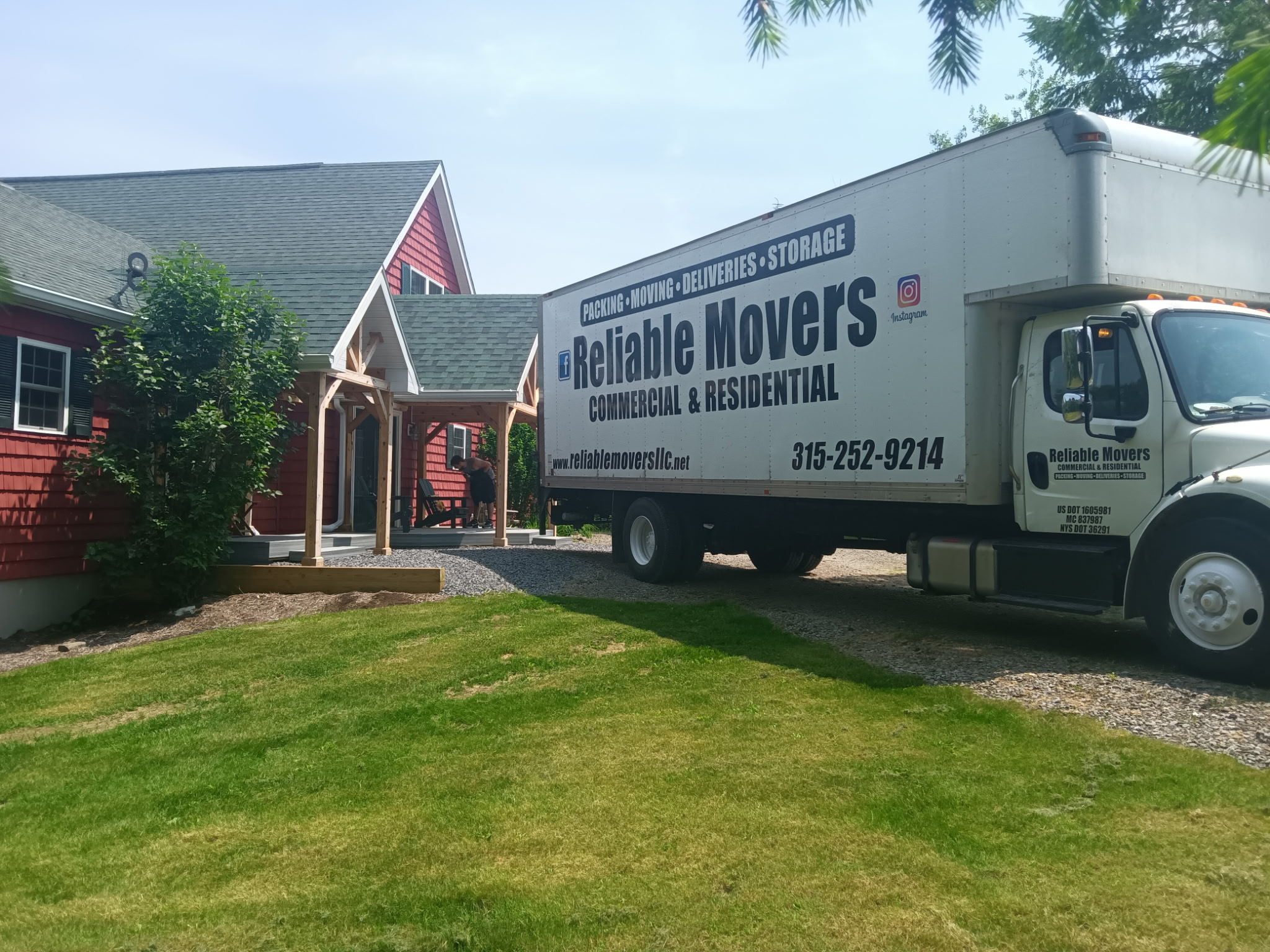 Reliable Movers truck for a long-distance move from Newfield NY to Churchville NY