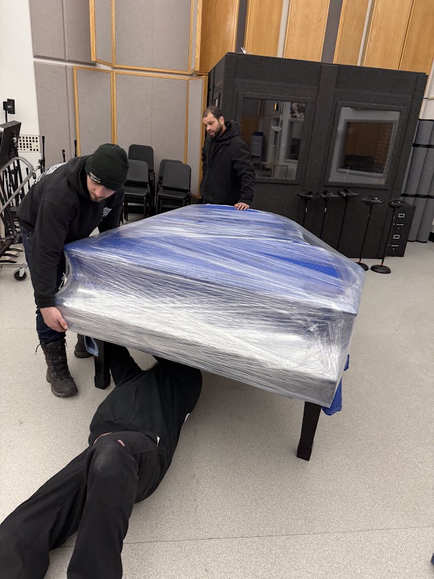 Baby Grand Piano moving by Reliable Movers