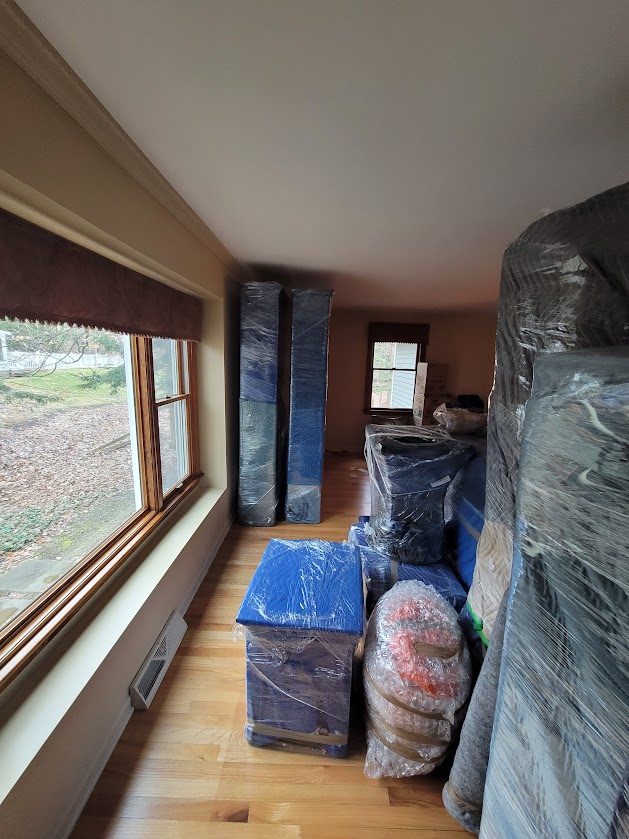 Interstate moving prep wrapping furniture Syracuse to North Carolina