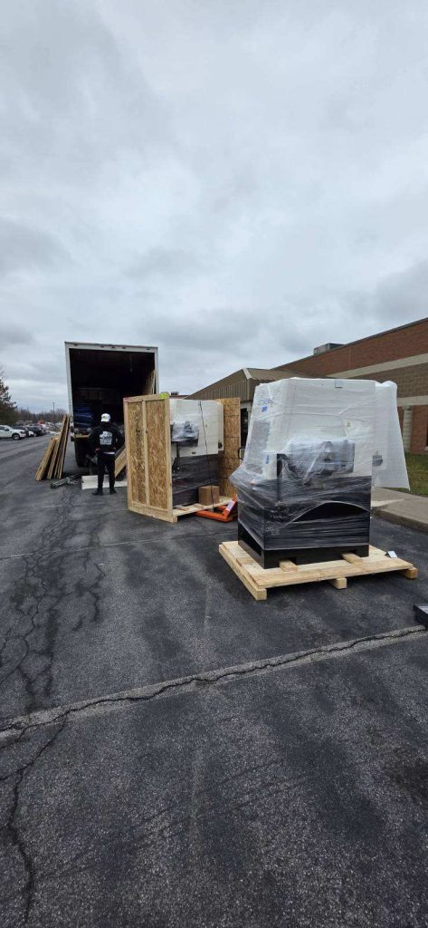 Unloading heavy equipment into tight commercial space Syracuse