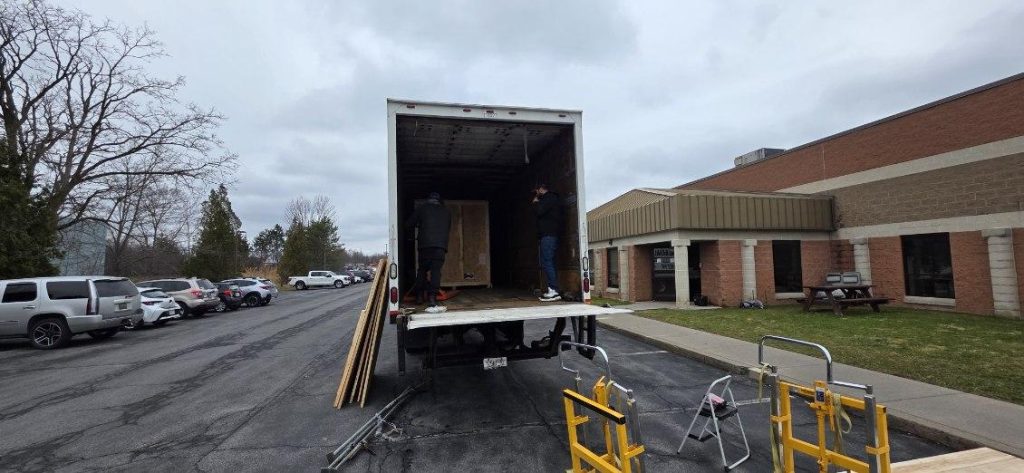 Unloading 1100 lb office equipment downtown Syracuse