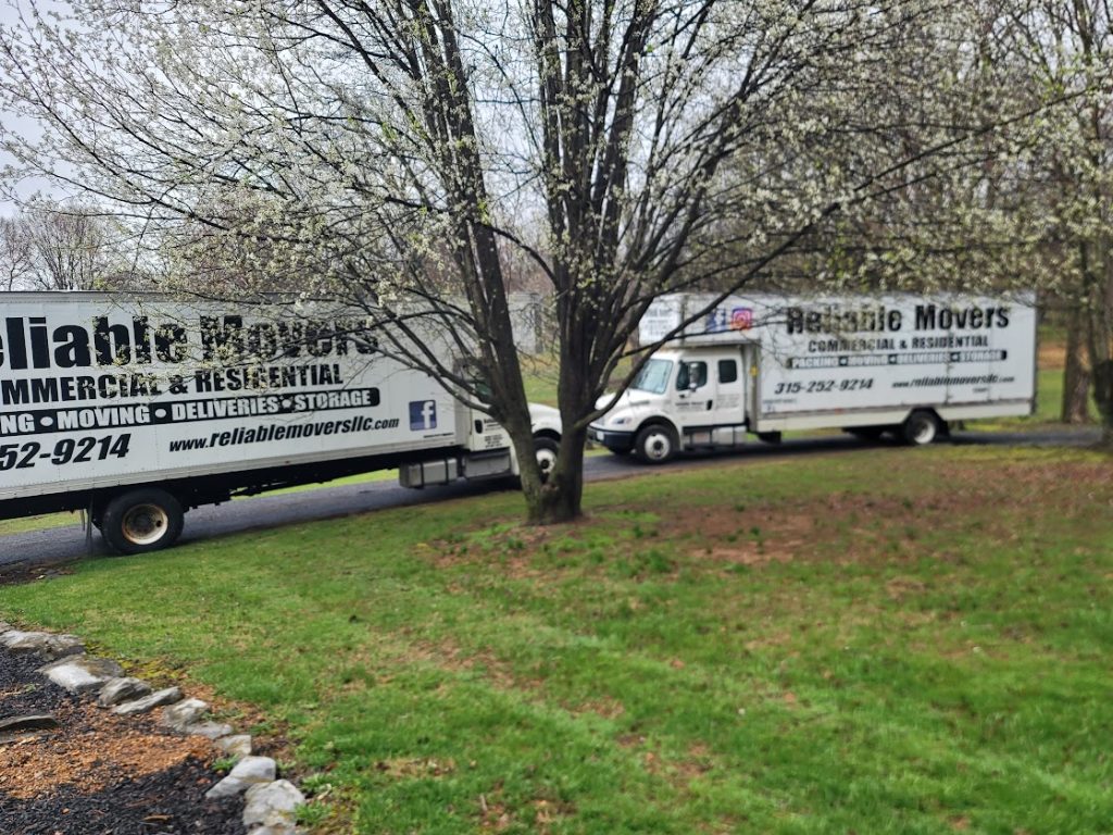 Reliable Movers trucks unloading in Shepherdstown, West Virginia 