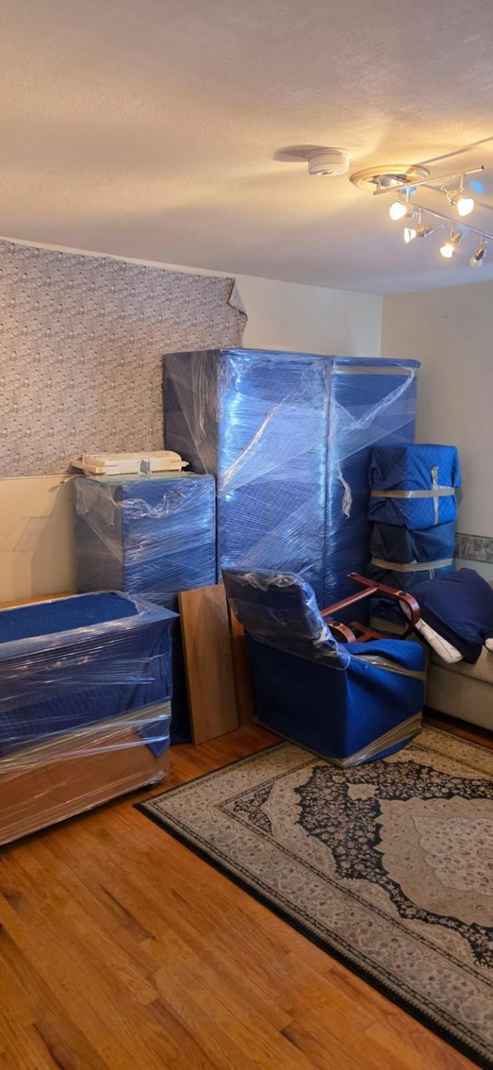 Furniture professionally wrapped and protected for moving