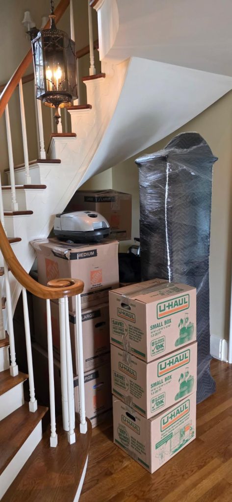 Grandfather clock and moving boxes professionally packed for interstate move from Skaneateles NY to South Yarmouth MA