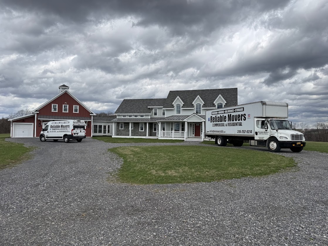 Reliable Movers trucks parked at residential Reliable Movers Syracuse NY trucks during local moving service from Skaneateles NY to Cazenovia NY residential move