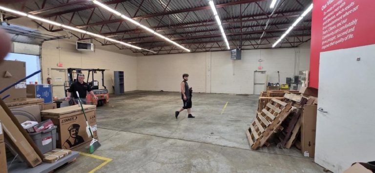 Warehouse inventory and equipment being moved by Reliable Movers in Buffalo