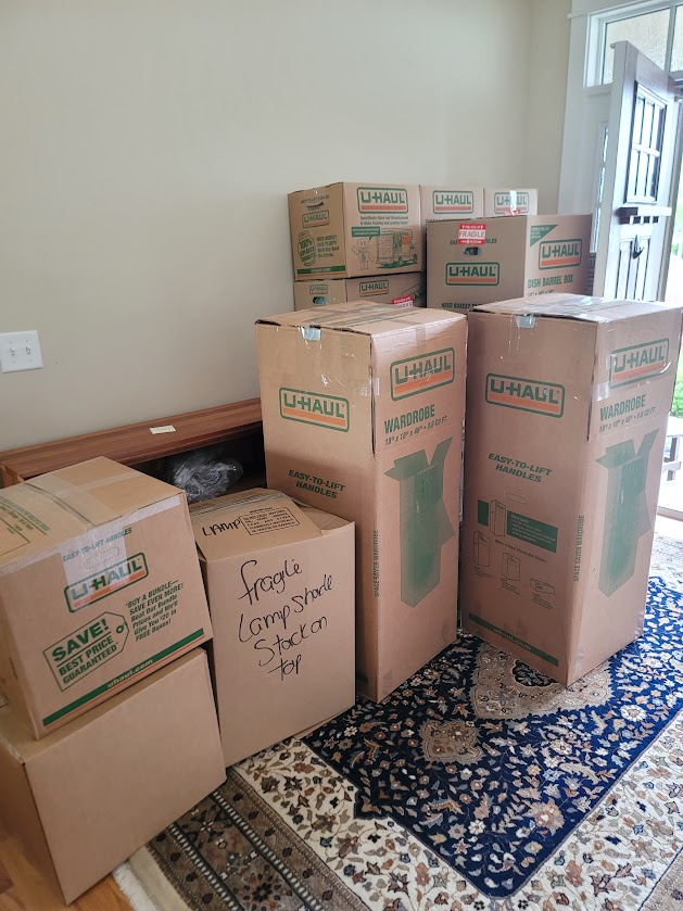 Professionally packed and labeled moving boxes prepared for a full-service interstate move by Reliable Movers.