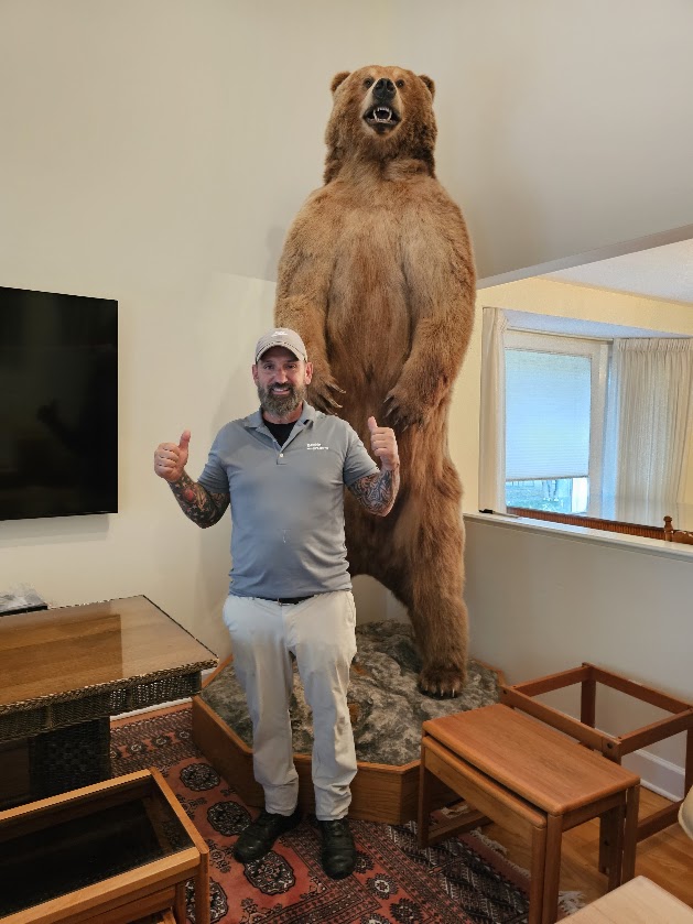 Reliable Movers owner Mike with a 12-foot bear moved during a Manlius New York local move
