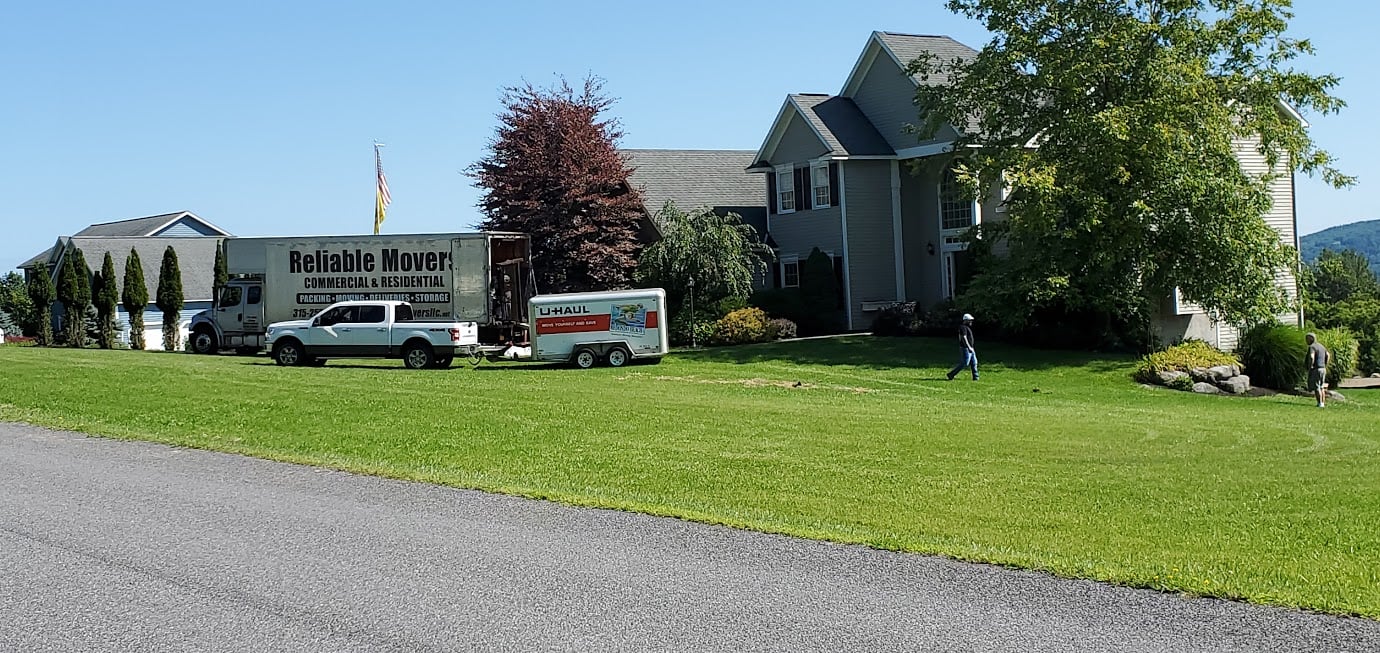 Reliable Movers professional crew loading household belongings for a customer move