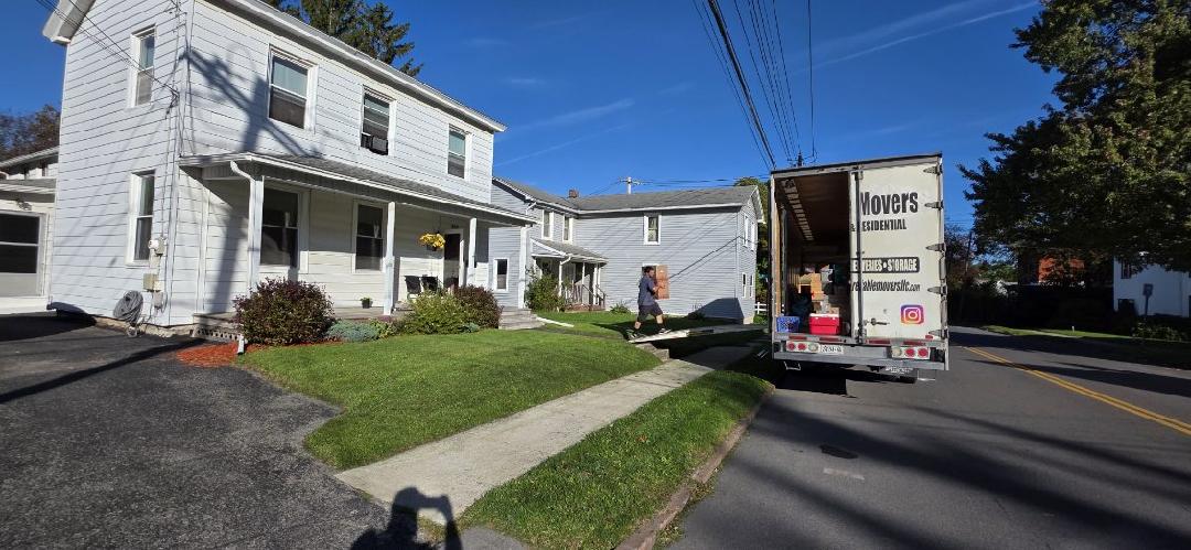 Reliable Movers crew loading household furniture in Auburn NY for delivery to Ohio
