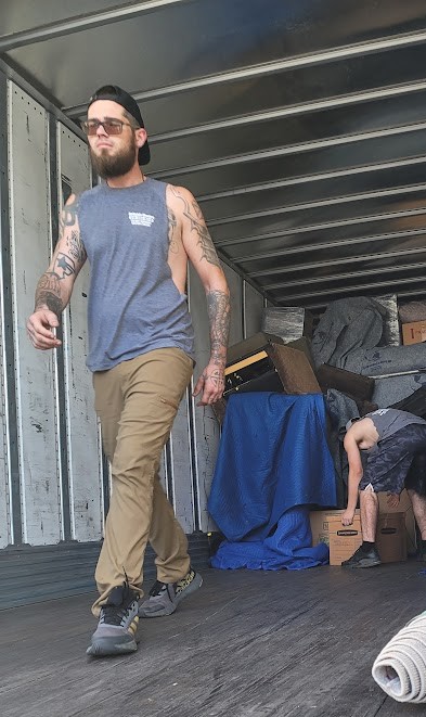 Collin, Reliable Movers crew member specializing in moving and packing