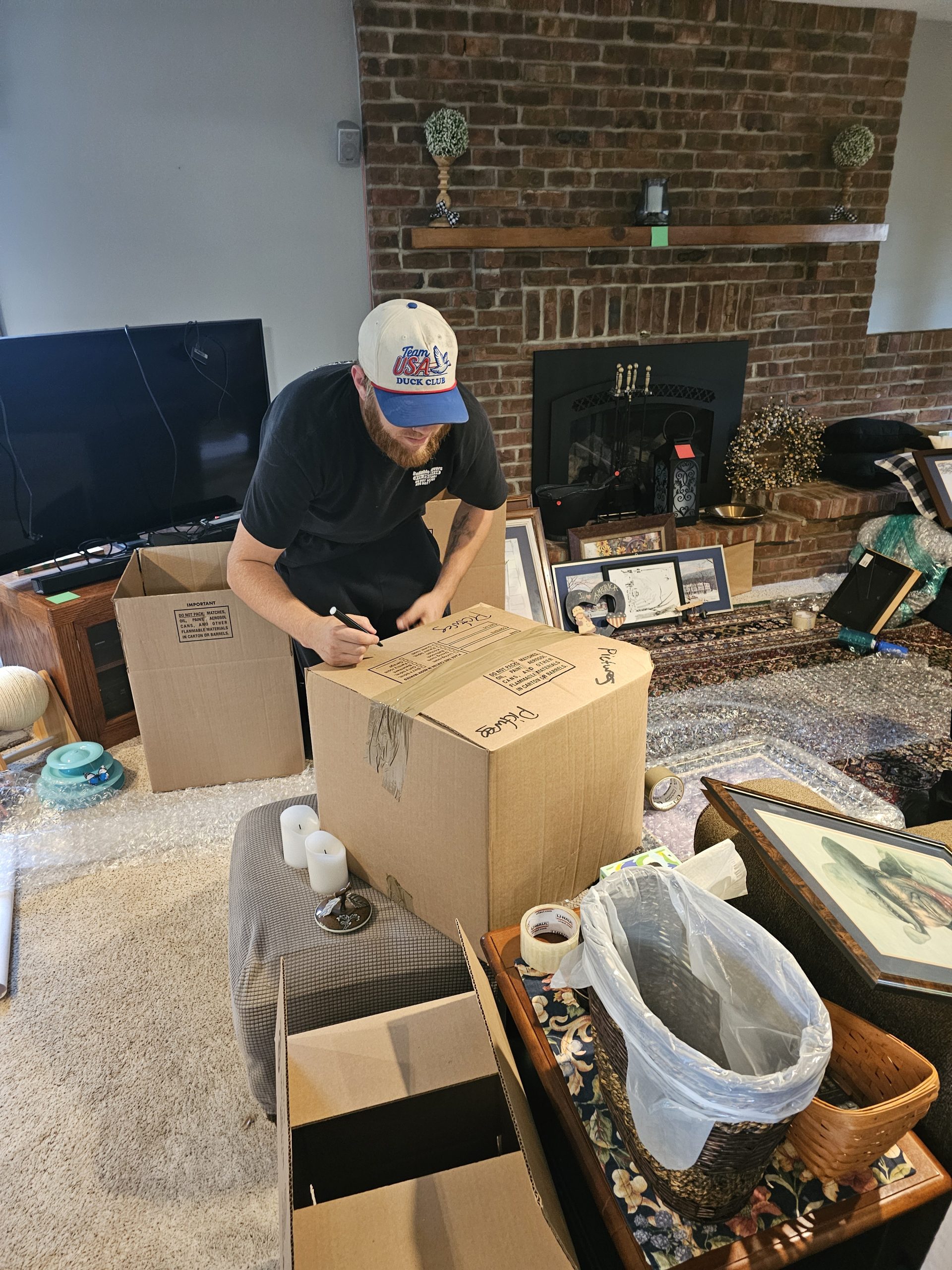Brandon M. of Reliable Movers LLC performing full-home packing in Syracuse NY for an interstate move to Ohio